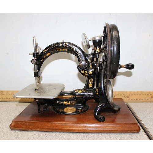 826 - Willcox & Gibbs antique swan neck sewing machine with original box