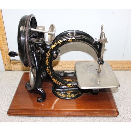 826 - Willcox & Gibbs antique swan neck sewing machine with original box