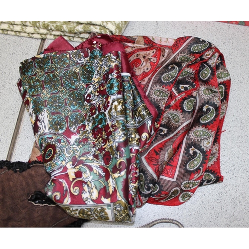 218 - Mixed lot of scarves & hand bags to include a boxed black scalloped shaped purse and lip-stick holde... 