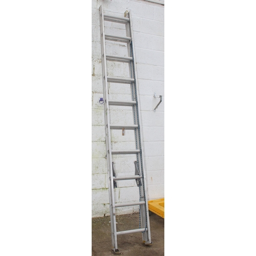 829 - Aluminium extension ladder each sections measures approx. 3 meters