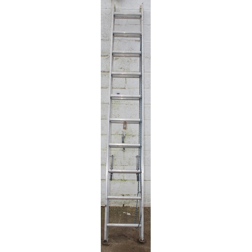 829 - Aluminium extension ladder each sections measures approx. 3 meters