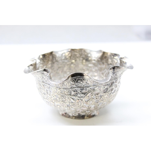 1067 - A high grade silver bowl with frilled edge and embossed decoration, likely Indian in origin, unmarke... 