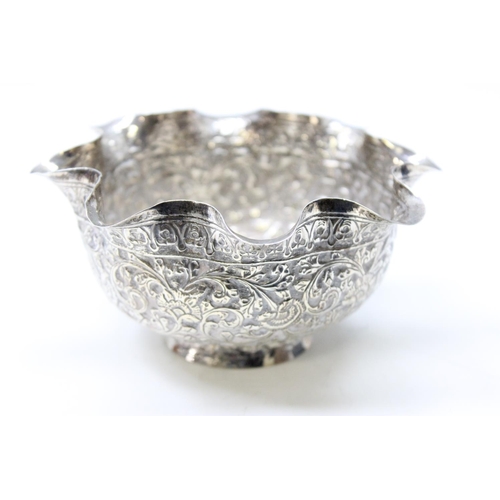 1067 - A high grade silver bowl with frilled edge and embossed decoration, likely Indian in origin, unmarke... 