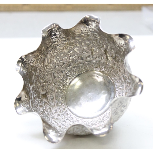 1067 - A high grade silver bowl with frilled edge and embossed decoration, likely Indian in origin, unmarke... 