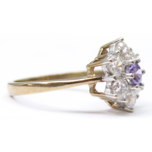 1157 - A 9ct gold floral cluster ring set with 5 white stones set round a central amethyst, approx size Q, ... 