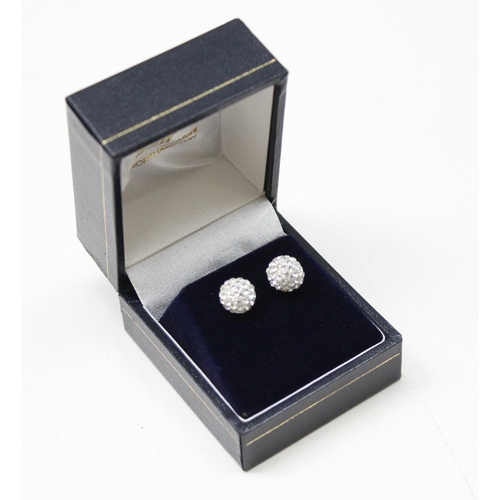 1160 - A pair of 9ct gold mounted white stone cluster stud earrings, in box