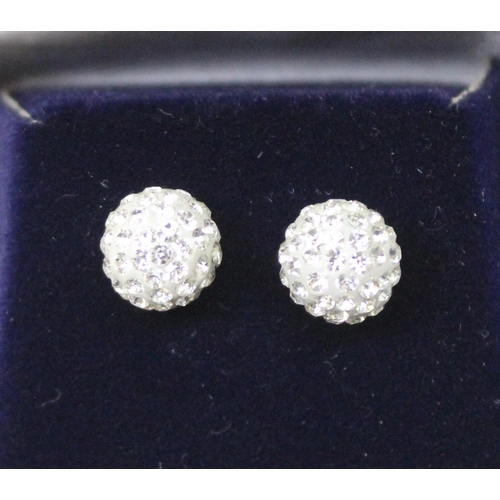 1160 - A pair of 9ct gold mounted white stone cluster stud earrings, in box