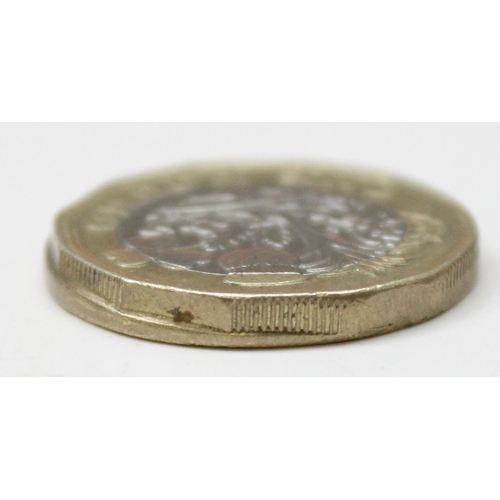 1201 - A rare 2018 £1 coin off centre mistrike coin