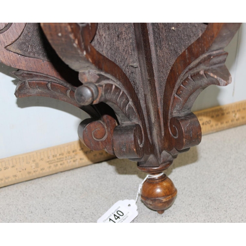 140 - Antique carved oak wall bracket, approx height 42cm