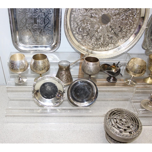 1057 - Large qty of assorted silver plate and other metalware, approx 6.5kg gross