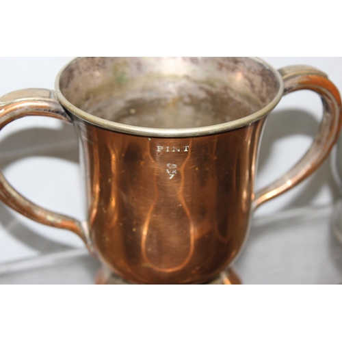 1063 - Qty of assorted antique and later pewter items, mainly tankards, and a Victorian copper loving cup, ... 