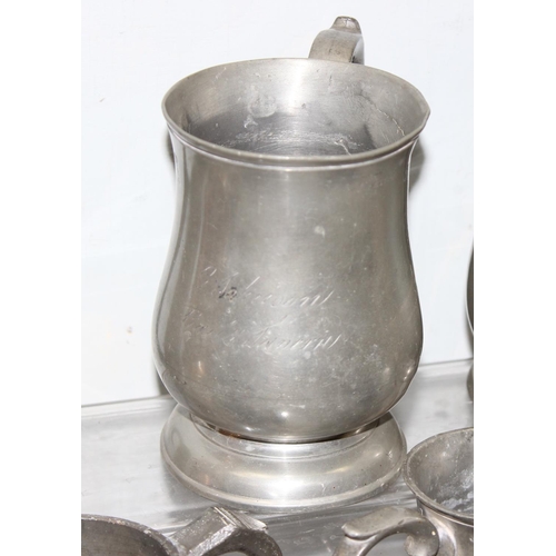 1063 - Qty of assorted antique and later pewter items, mainly tankards, and a Victorian copper loving cup, ... 