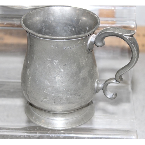 1063 - Qty of assorted antique and later pewter items, mainly tankards, and a Victorian copper loving cup, ... 