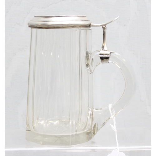 1064 - A German facet cut glass and 0.800 silver lidded stein, inscribed for Berlin 1938, approx 16cm tall