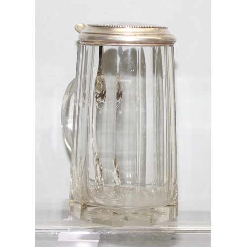 1064 - A German facet cut glass and 0.800 silver lidded stein, inscribed for Berlin 1938, approx 16cm tall