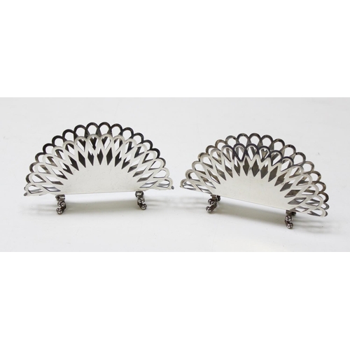 1069 - A pair of 925 silver napkin holders with pierced design, marked 925 and XRF confirmed to be silver, ... 