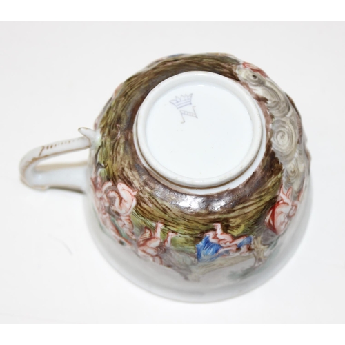 1693 - A 19th century Capodimonte cabinet cup and saucer with hand painted relief decoration & a Meissen Au... 