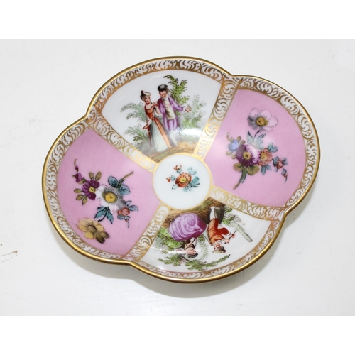 1693 - A 19th century Capodimonte cabinet cup and saucer with hand painted relief decoration & a Meissen Au... 