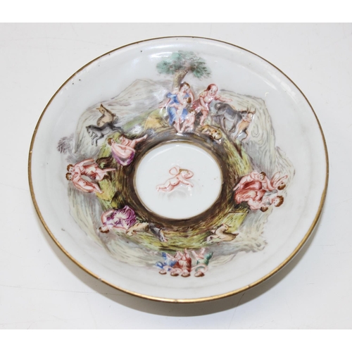 1693 - A 19th century Capodimonte cabinet cup and saucer with hand painted relief decoration & a Meissen Au... 