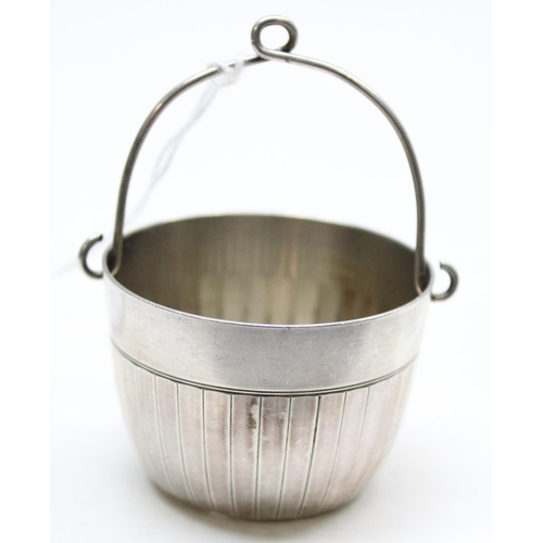 1078 - An unusual 19th century silver tea strainer formed as a bucket, mark unknown but possibly Dutch colo... 