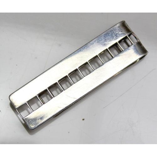 1162 - Vintage silver money clip with pierced ladder design, import marks for London 1982