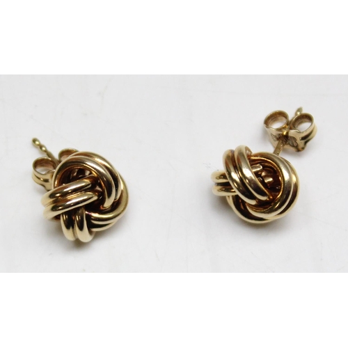 1166 - A pair of 9ct gold knot stud earrings, approx 2.69g gross