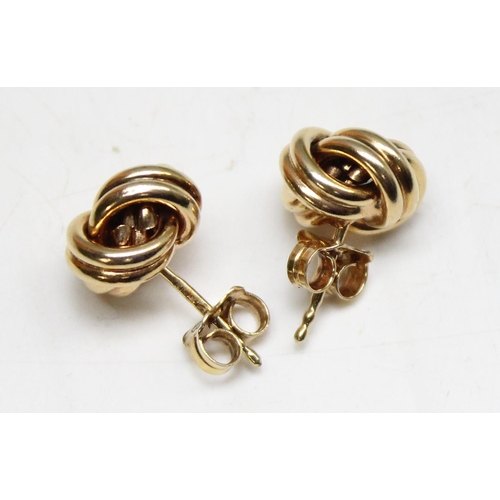 1166 - A pair of 9ct gold knot stud earrings, approx 2.69g gross