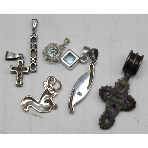 1168 - 9 assorted silver mounted pendants and lockets