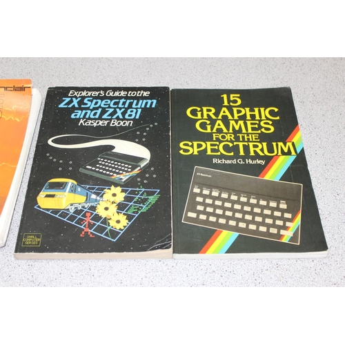 1575 - Sinclair ZX Spectrum computer and a large qty of assorted cassette games etc