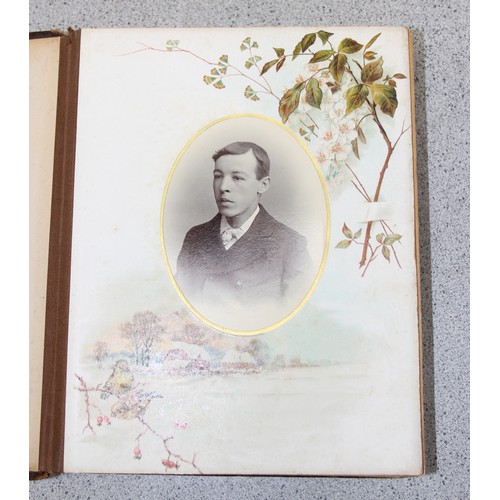 541 - A Victorian photograph album and contents, many photographs