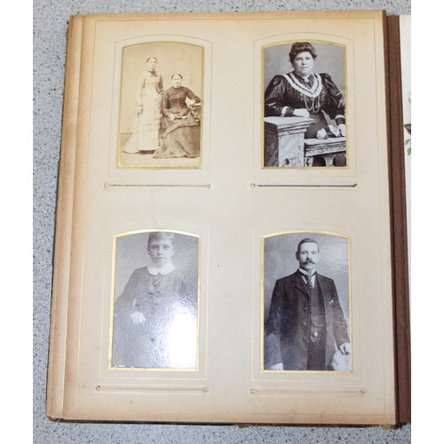 541 - A Victorian photograph album and contents, many photographs