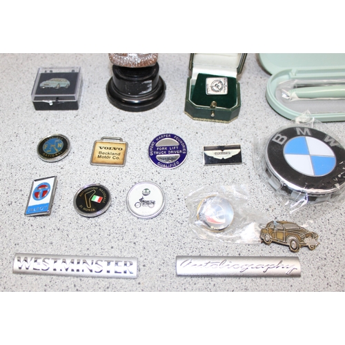 731 - Tool box full of motoring relating pin badges, car badges, pens & other automobile odds