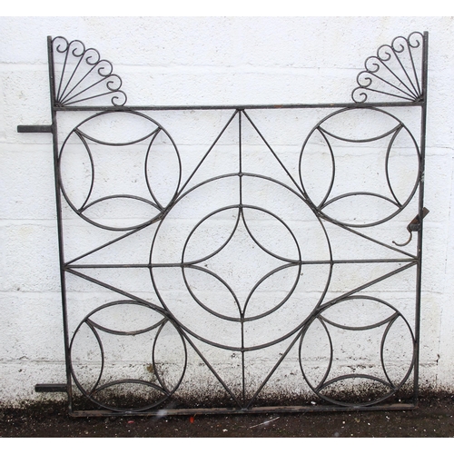 305 - A pair of heavy duty decorative wrought iron garden gates with posts, each approx 116cm wide