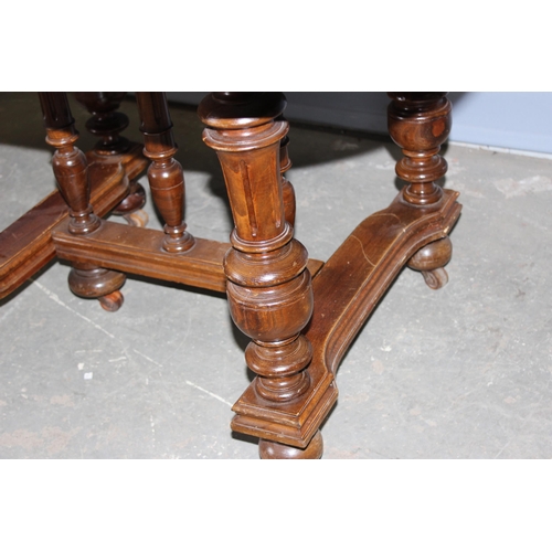 10 - A small late 19th century or early 20th century French extending walnut dining table with impressive... 