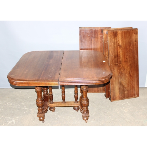 10 - A small late 19th century or early 20th century French extending walnut dining table with impressive... 