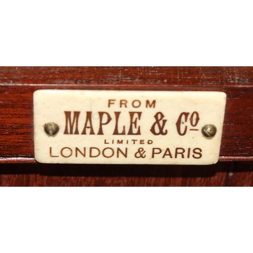 23 - A late 19th or early 20th century carved wooden sideboard by Maple & Co of London & Paris, 2 cupboar... 