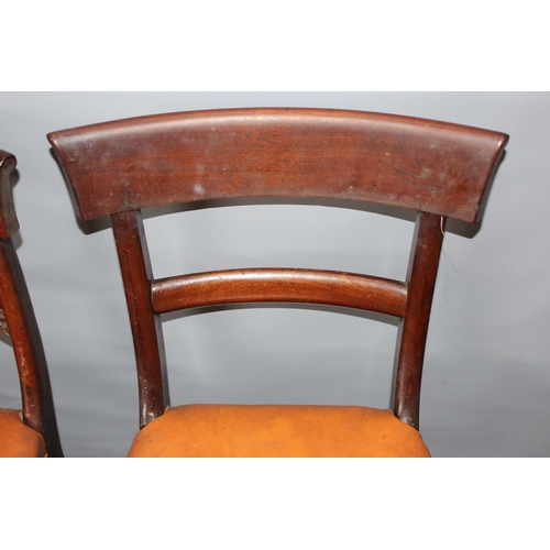 26 - A matched set of 4 Regency or William IV period rail back mahogany dining chairs with tan leather se... 