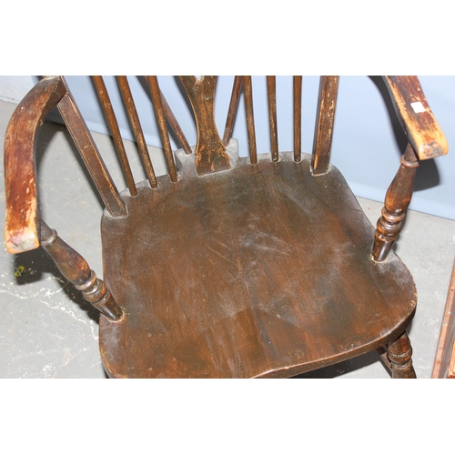 29 - A vintage wheelback country armchair, a black painted Edwardian side table and a wooden storage box ... 