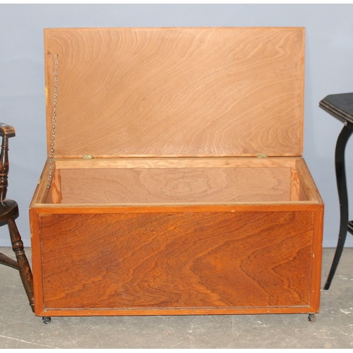 29 - A vintage wheelback country armchair, a black painted Edwardian side table and a wooden storage box ... 