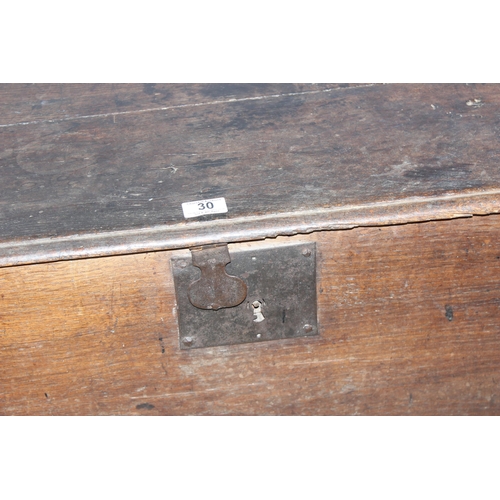 30 - A small antique carved oak coffer with iron fittings, likely 18th century, approx 90cm wide x 47cm d... 