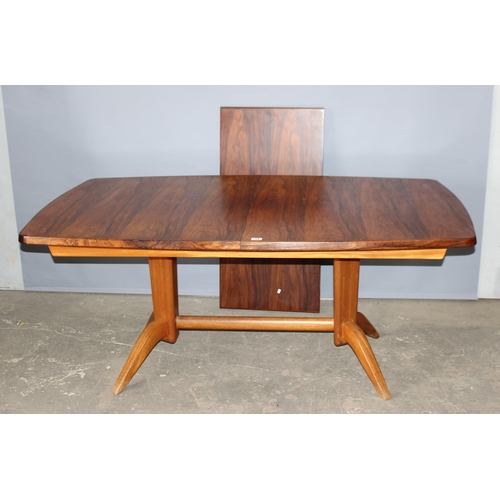 33 - Gordon Russell, a retro mid-century extending dining table with extra leaf, believed to be either te... 