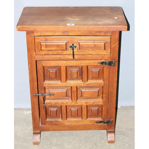 40 - A 20th century carved wooden side cabinet with drawer, approx 60cm wide