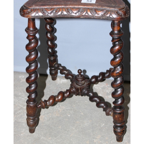 54 - A small vintage oak stool with carved top and barleytwist legs