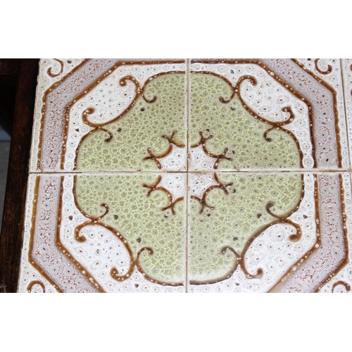 60 - Retro tile topped coffee table, approx 105cm wide