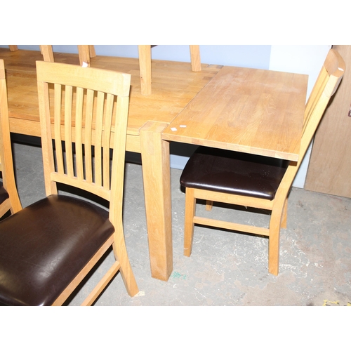 64 - Modern light oak dining table with 8 brown faux leather seated chairs and 2 extra leaves, extending ... 