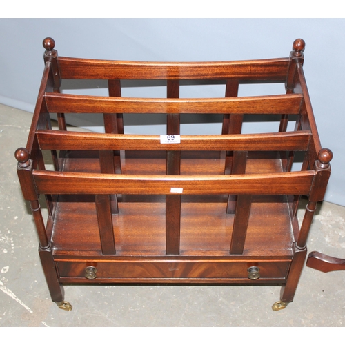 69 - A modern mahogany canterbury magazine rack and a leather topped jardinière or torchiere stand (2)