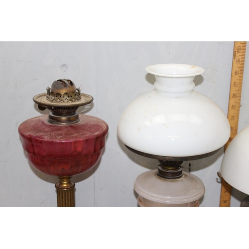 235 - 4 assorted antique and later oil lamps