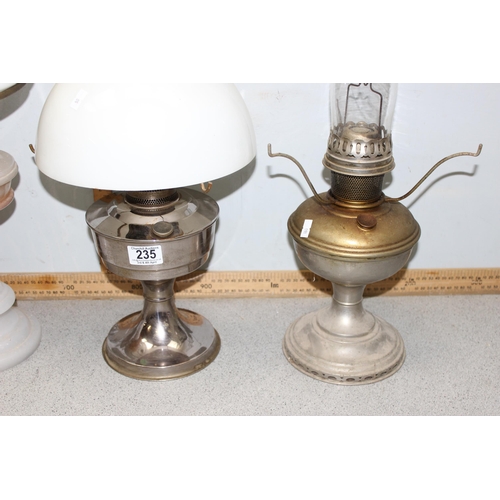 235 - 4 assorted antique and later oil lamps