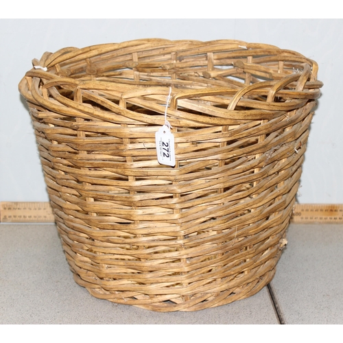 272 - A woven wicker log basket, approx 49cm in diameter