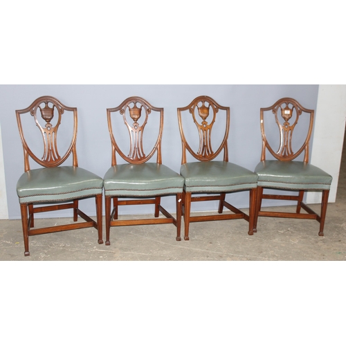 75 - A set of 4 19th century mahogany dining chairs with shield and urn backs and recovered studded green... 